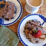 Healthy blueberry bran pancakes with a cup of tea