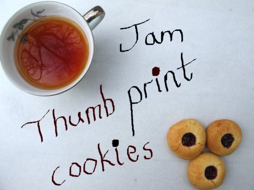 Jam thumbprint cookies with a cup of tea